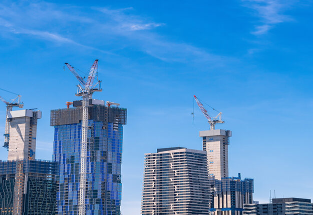 City skyline with buildings under construction